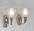 Capon frères & Muller A beautiful pair of French art deco wall sconces made around 1925-1930 in nickel plated solid brass...