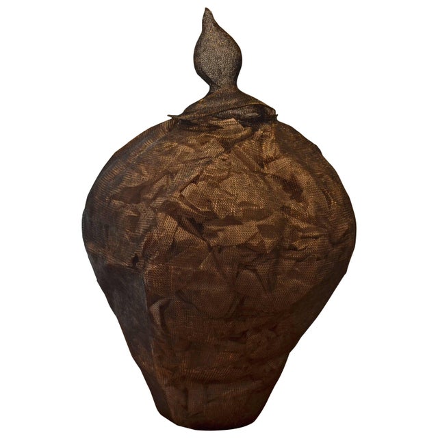 Antique Folk Art from Flores. Handwoven iron mesh container with an hour glass shape. Measures: 10- 22" DIA x 34" high....