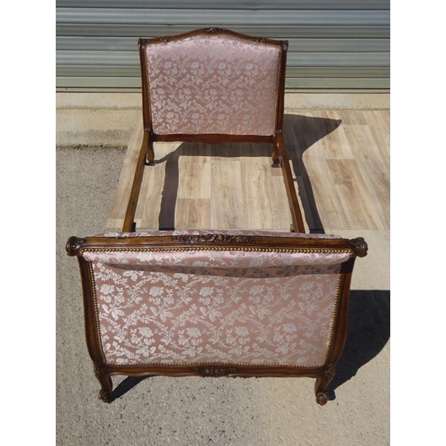 Antique louis xv bench or single bed. the frame and sides are made of solid wood, stained dark oak. Numerous details are...