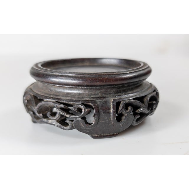 We are selling this small well carved Chinese display stand base. This base has nice openwork design on the sides carved...