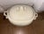 French rustic cream colored ceramic soup tureen featuring ornate handles and a crackle finish, Arno antique ceramics 40cm...