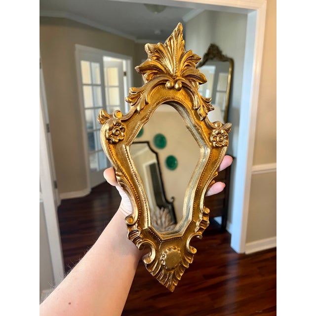 Pair of Vintage Ornate Italian Florentine Rococo Style Giltwood Mirrors- These stunning gold carved giltwood mirrors...