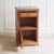 This original bedside table dates from France around 1910 and impresses with its simple lines, high-quality workmanship,...