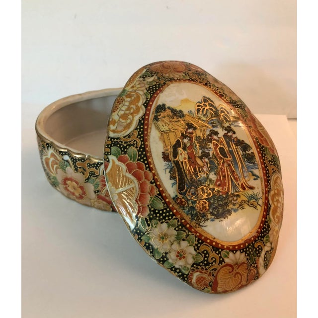 This Vintage Cloisonné Ceramic Lidded Box With Scalloped Edge is a great option for any traditional or Asian interior...