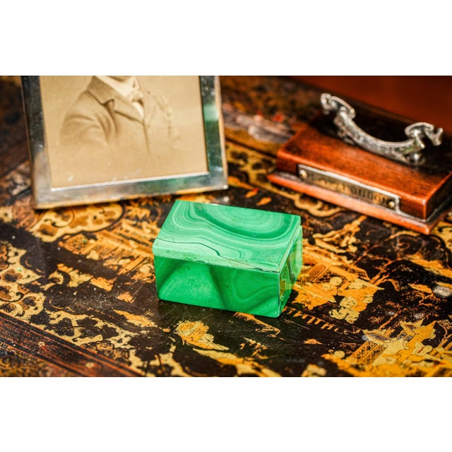 Delight in the striking beauty of this rare vintage malachite specimen box, a treasure for collectors and lovers of...