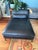 Designer chaise lounge by Roche Bobois. Crafted with premium black leather and sleek modern lines, this piece combines...