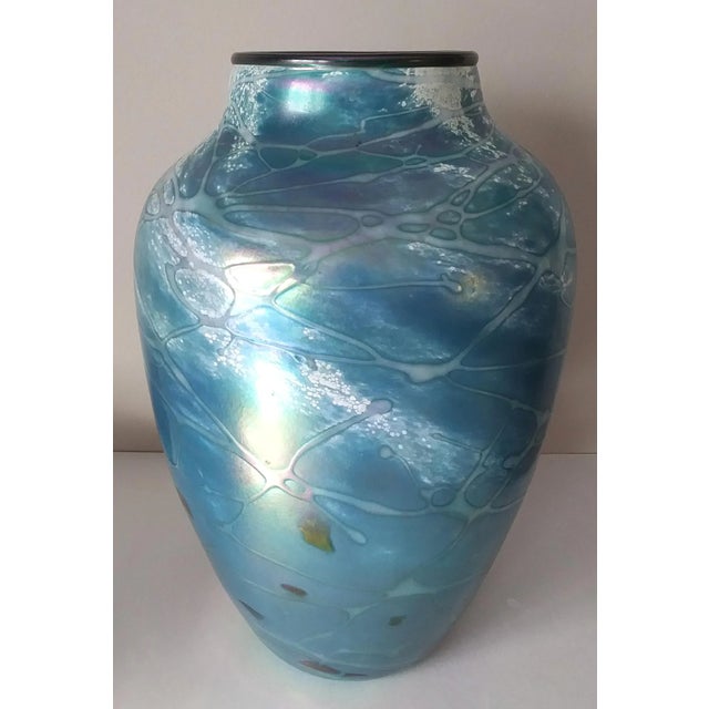 An early example of highly regarded artist Tom Stoenner's hand blown luster series, this large vase in the series,...