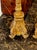 The product is a pair of 19th century Italian giltwood torchieres converted into floor lamps. These elegant lamps are...