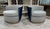 A pair of Provo swivel chairs by Kravet furniture. The 360-degree swivel chairs feature a loose seat cushion and a tight...