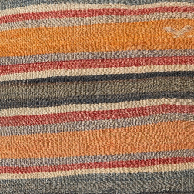 Add a touch of history and warmth to your space with this vintage handmade Turkish wool kilim cushion cover. Crafted from...