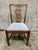 A handsome set of eight antique solid mahogany dining chairs in the classic Chippendale style, dating to circa 1830. This...