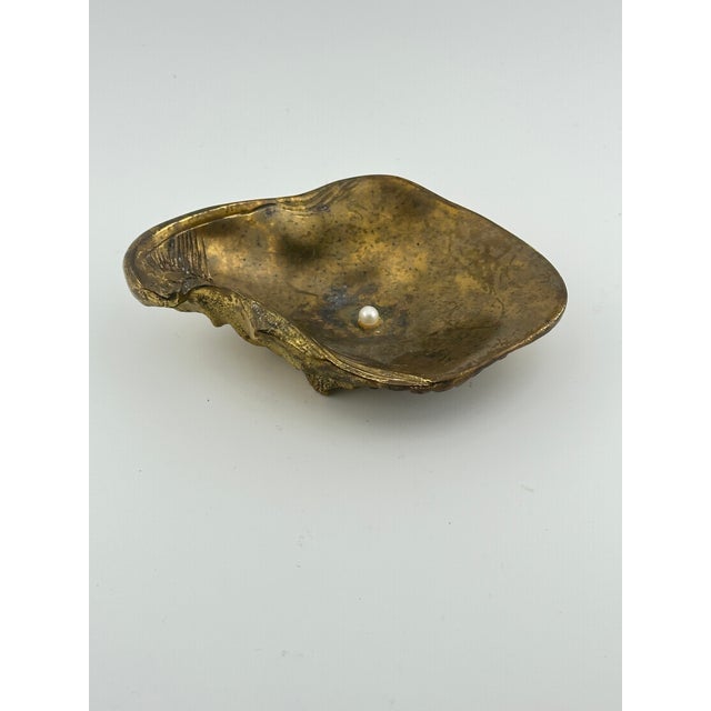Vintage brass shell trinket dish to hold your small treasures. This is a pre owned item so please see all pictures and ask...