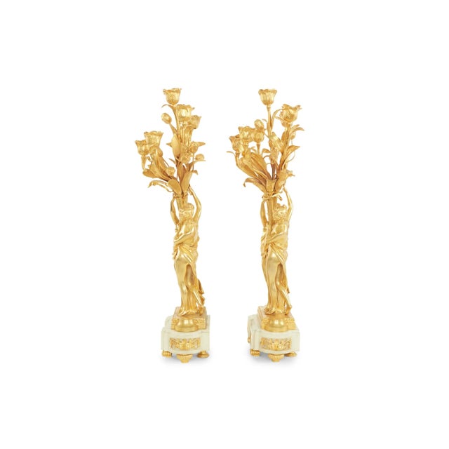 19th century pair of gilt bronze ormolu / marble Louis XV style six light gilt candelabras. Each candelabra featuring with...