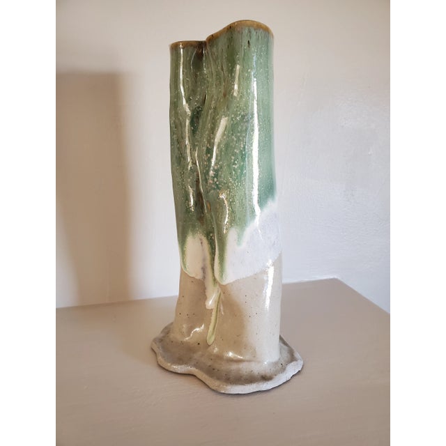 Lovely vintage ceramic vase glazed in muted green and cream is finished at the top with bronze. Abstract freeform shape...