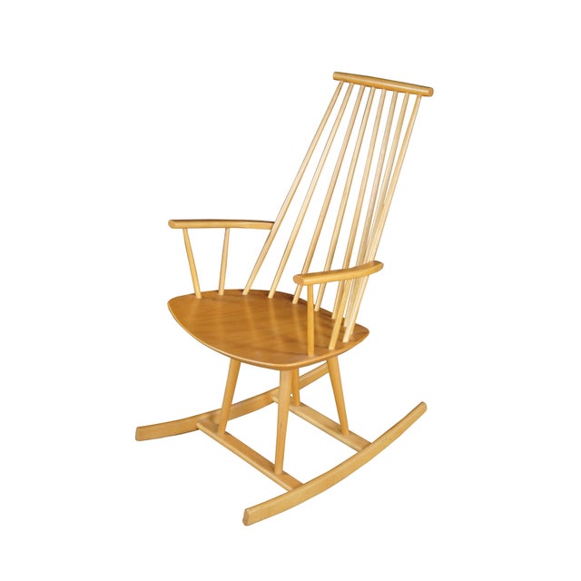 Jorgen Baekmark / FDB Mobler Danish Modern Beech Rocking Chair, circa 1970s. Features a spindle back and spindled tapered...