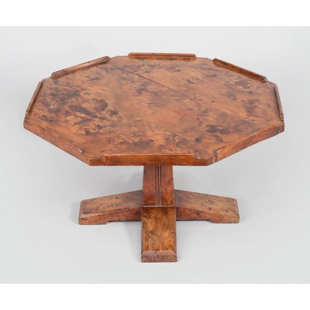 English Arts & Crafts movement octagonal-shaped burr yew wood Lazy Susan, the rotating top mounted on a squared pedestal...