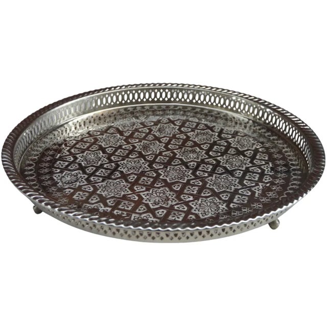 Vintage highly crafted, engraved and detailed Moroccan tray. Constructed of nickel silver and engraved with remarkable...