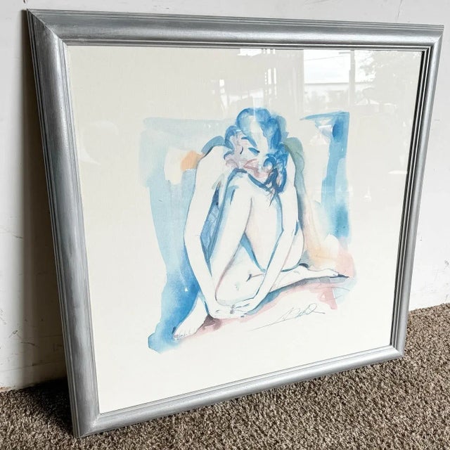 Adorn your walls with the grace and beauty of a Vintage Signed and Framed Watercolor Painting of a Kneeling Lady. This...