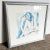 Adorn your walls with the grace and beauty of a Vintage Signed and Framed Watercolor Painting of a Kneeling Lady. This...