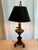 Unique handpainted, marbelized metal lamp in hunter green, black and gold. Stands 28” high table lamp. Base is 8” with...