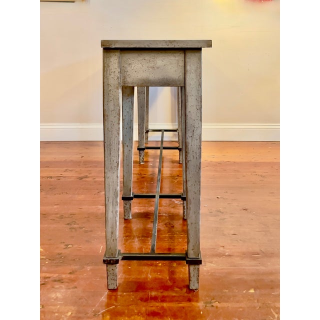 Bring an upgraded look to your living space with this console table, which features a gorgeous, speckled gray finish and...