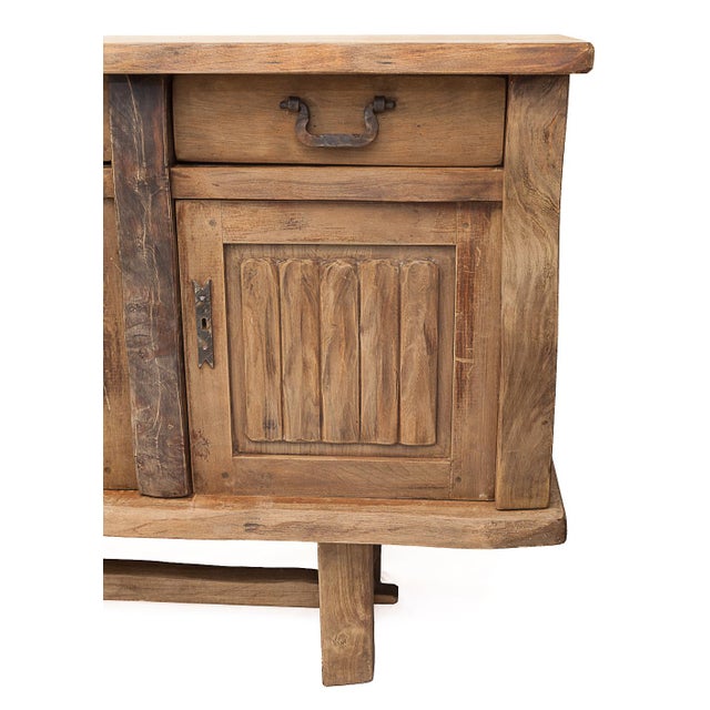 Vintage Brutalist 4-door sideboard. Solid elm. Attributed to Olavi Hanninen and produced in Finland by Mikko Nupponen. 4...