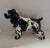 This is a stunning English springer spaniel figurine, done in a glazed ceramic. The piece is unmarked. CGr