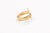 A 21 karat gold ring with a bronze coin. This bronze coin is from Ancient Rome and has a profile which is well delineated....