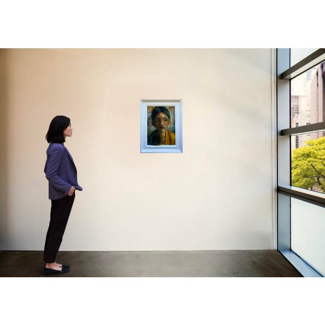 This stunning expressionist portrait, signed ngurah, is the work of renowned balinese artist i gusti agung ngurah kresna...