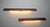 Unusual pair of Danish wall or reading lights incorporated into teak shelves dating from the 1960s.