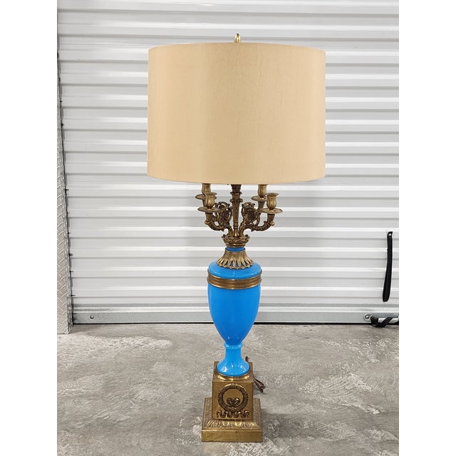 Antique French 19th century large and blue opaline candelabra table lamp, featuring ornate acanthus leaf and wreath gilt...
