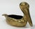 Beautiful detail to this heavy cast brass bowl/catchall/planter in the shape of a pelican or seagull. Nice design detail...