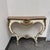 Design Plus Gallery presents a Rococo Revival Style Console Table. This wall mounted piece showcases a serpentine wood top...