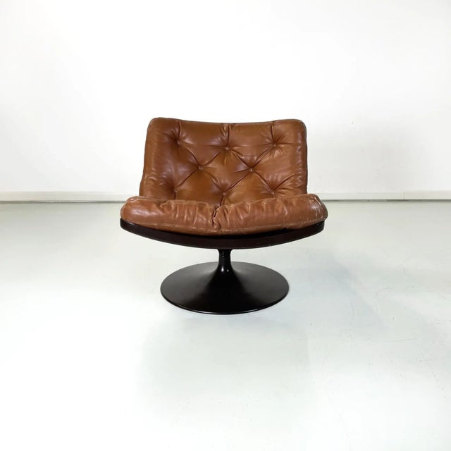 Italian space age armchair in brown leather and black plastic by Play, 1970s Armchair with Tulip style swivel round base...