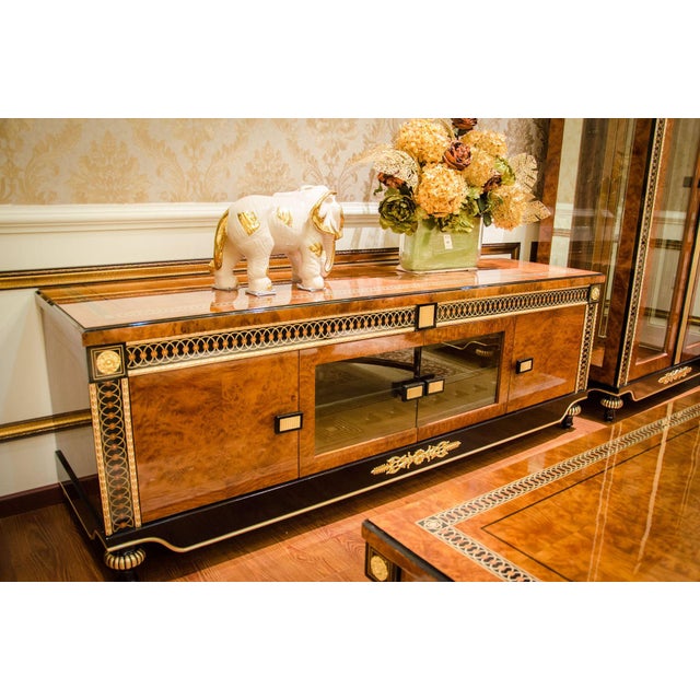 Make a dramatic statement with this luxury solid wood floor cabinet and media credenza, richly finished in a warm walnut...