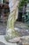 Garden Statue in Reconstituted Stone with Figure of Classical Maiden Holding Flowers For Sale - Image 11 of 16