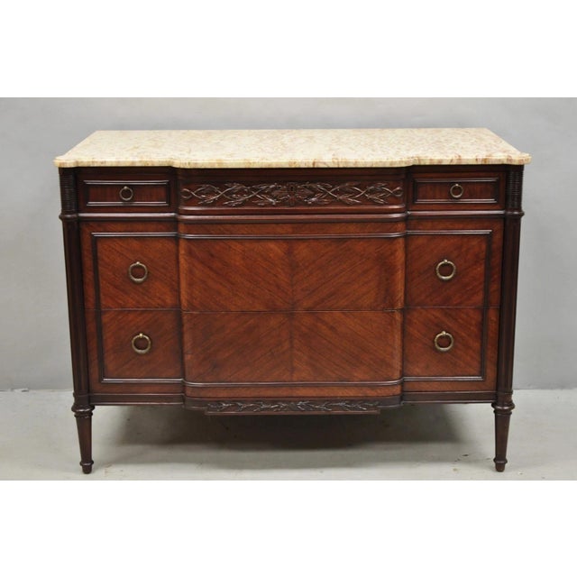Antique French Regency/Louis XVI Maison Jansen Style Mahogany Marble Top Dresser Commode. Item features a serpentine...