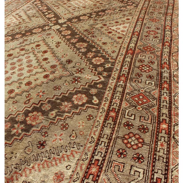 Cream Early 20th Century Antique Khotan Rug With Paired Diamond Medallions in Brown and Earth Tones For Sale - Image 8 of 10