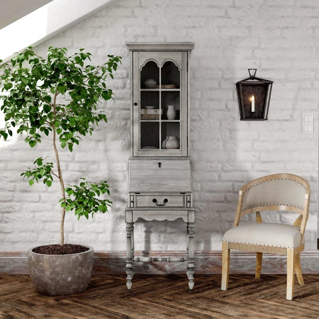 With space to stage, stow, and even work, this secretary desk is an essential addition to any den, this desk combines...