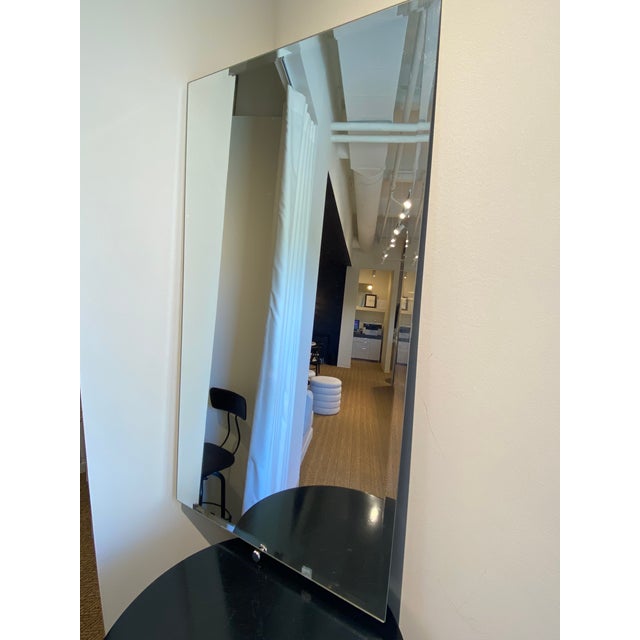 Elevate your contemporary bathroom or dressing area with the striking Ginger Vanity Mirror. This piece transcends the...