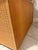 A stunning piece of designer coastal living, this vintage Polo Ralph Lauren wicker and rattan bowfront dresser is a rare...