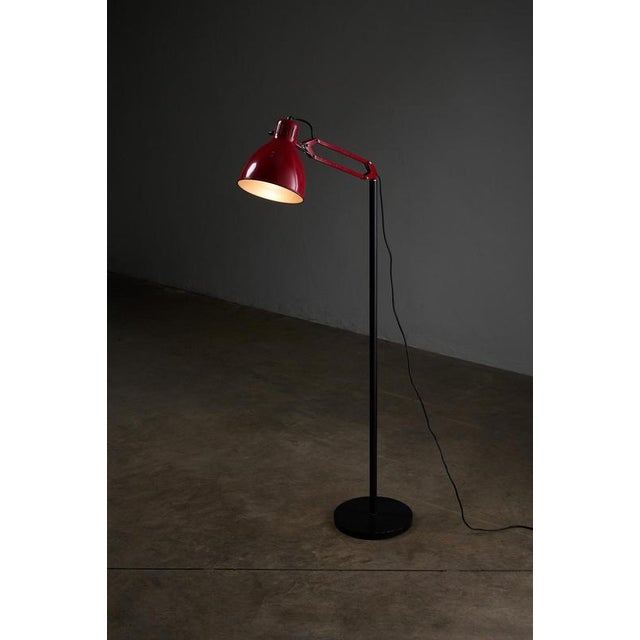 Two-tone "arma" floor lamp, produced by metalarte in spain during the 1970s. This version features a bold color...