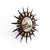 A 20th-century Spanish gilded iron sun mirror, featuring a radiant sunburst design crafted in hand-forged iron with a rich...