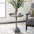 Inspired by the sleek curves of modern metalwork, this Corvus Round Side Table is a contemporary masterpiece. Its dark...