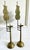 A pair of tall candlesticks fashioned out of solid brass from Korea circa 1900s (end of Joseon Dynasty to Korean Empire...