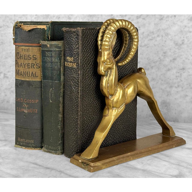 An Art Deco Brass Ibex Library Sculpture, c.1970's - Cast Brass with a Mild Tarnished Finish - Unpolished - 9" Tall -...