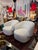 Wonderful comfortable pair of swivel chairs in a soft cream color. The have pinstripe channeling on the exterior backs and...