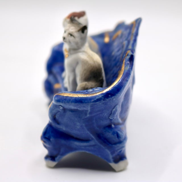 Ceramic Antique Late 19th Century German Porcelain Miniature Figurine – Two Cats on Blue & Gold Armchair, Mold No. 3896 For Sale - Image 7 of 11