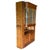 An Art Nouveau oak bar-back cabinet, circa 1910, with leaded beveled glass doors and carved ornament. The tall...