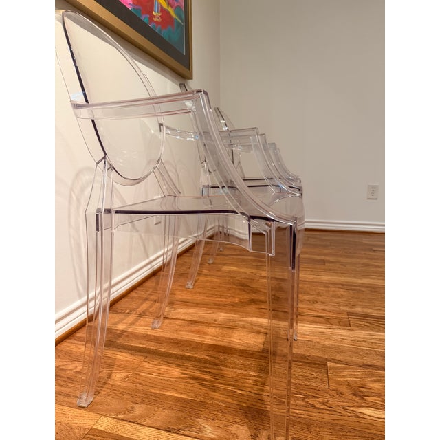 A set of three authentic “Victoria Ghost” armchairs designed by Philippe Starck for Kartell—an iconic reinterpretation of...